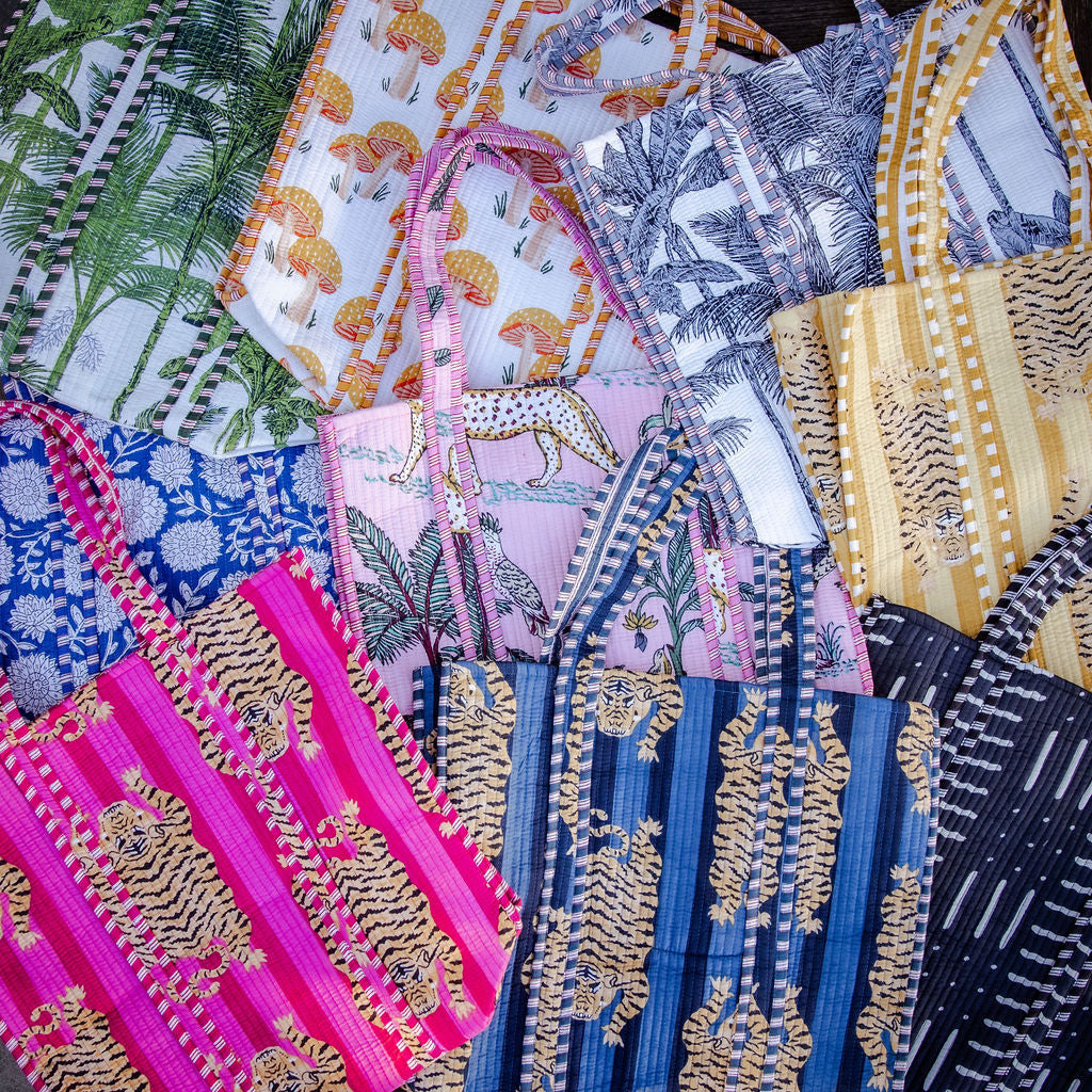 Reversible, machine washable, structured tote bag with pockets collection.