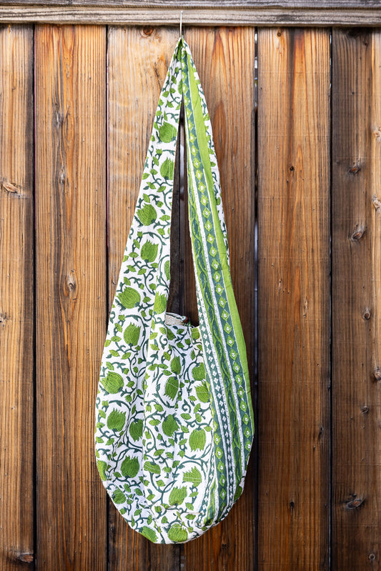 Unique slouch bag collection. Available in different patterns and colors. Green floral pattern.