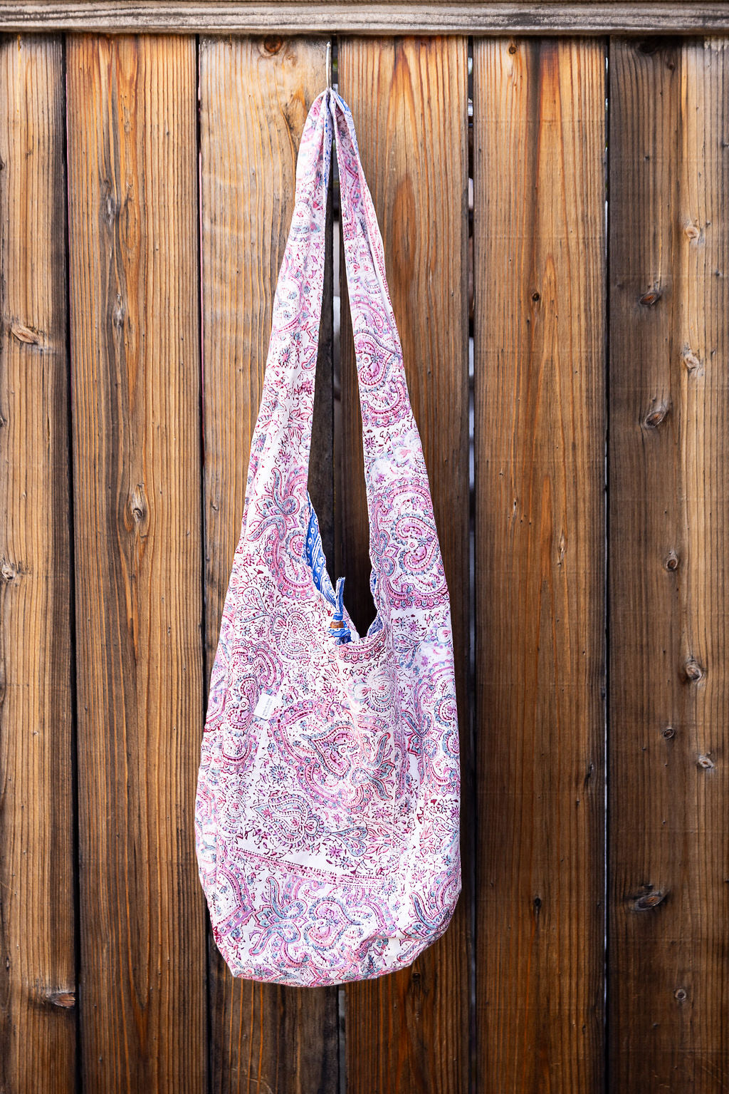 Unique slouch bag collection. Reversible. Available in different patterns and colors. Pink and blue design.
