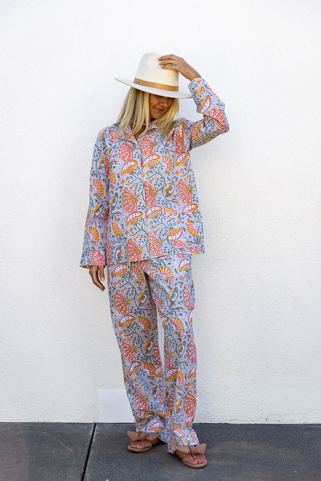 Model is wearing Tuk and Lu's patterned cotton PJ set with the pant. Also comes with shorts and tote.