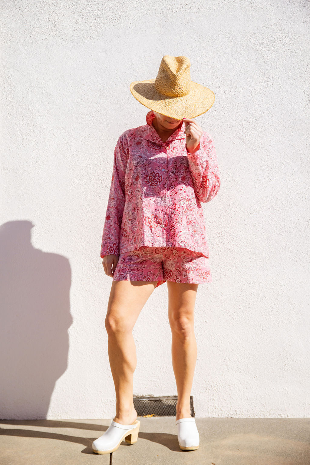 Model wearing Tuk and Lu's pink patterned cotton PJ set with the short. Also comes with tote.