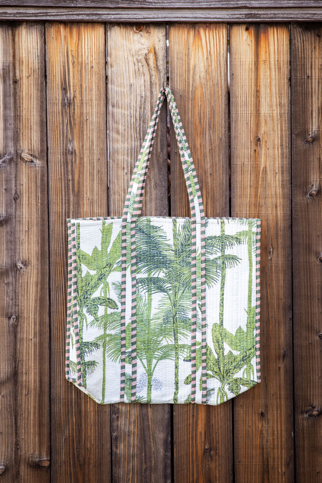 Cotton, reversible, machine washable, structured tote bag with pockets. palm tree pattern, green.